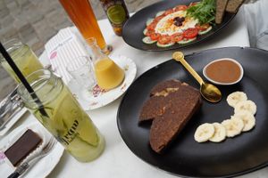 Detox Water, Miramare Bread, Banana Time, Cake, Big Ginger Shot & Beer at Simply Raw Bakery and Bistro in Vienna