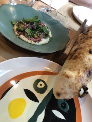 Hummus and the bread was coated with coconut oil not butter.    at Pizzerija Minutka in Postojna