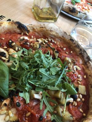 Veggie pizza no cheese with roasted garlic, aubergine, mushrooms and tapenade. Rocket on the top. Absolutely gorgeous  at Pizzerija Minutka in Postojna