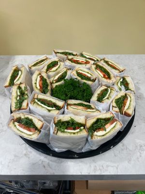 Catering available for select sandwiches (tomato pesto and arugula sandwiches pictured.) at V Cafe  in Long Beach