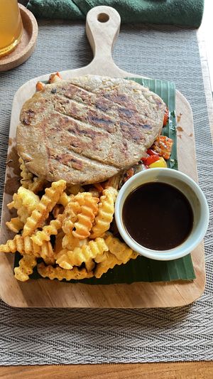 Tempeh steak with vegetables, fries and gravy - very good!  at Anandinii Organic Garden & Kitchen in Sidemen