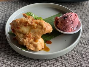 Pisang goreng with strawberry ice cream  at Anandinii Organic Garden & Kitchen in Sidemen