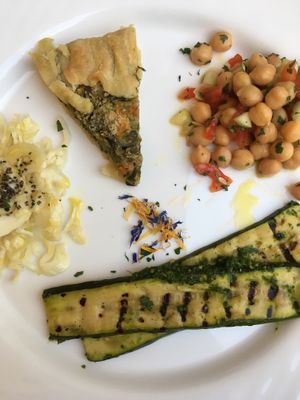 Quiche, chickpeas, grilled courgettes, and cabbage salad  at Agriturismo Tenuta Antica in Cessole