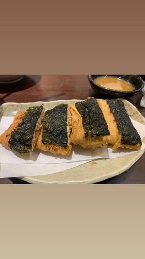 Tofu skin stuffed with mushrooms and topped with seaweed   at Hoshina 穗科 - Songshan District in Taipei
