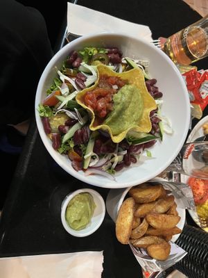 Mexican salad with potato wedges  at Harley's American Restaurant & Bar in Tenerife