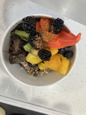 Three flavors of vegan yogurt, fresh berries and nuts, carob chips and coconut    at Lizzy's Premium Frozen Yogurt in Desert Hot Springs