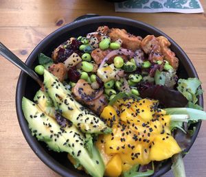 Individual bowl with v-chicken, mango, whole grain rice and more (~15€)  at MALOA Poke Bowl in Mannheim