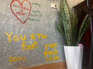 guests writing at Village Pub & Cafe in Lao Cai