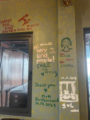 writing at Village Pub & Cafe in Lao Cai