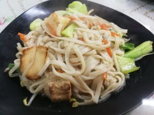 steamed rice noodles with hericium mushrooms and veggies. at Fuxing Tai Yue Sushi Guan - 福幸台越素食館  in Hualien