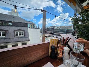 Seats outdoors on the roof at Basta in Stockholm