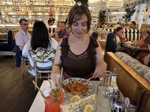 View of restaurant, half-eaten pasta bolognese.  at Basta in Stockholm