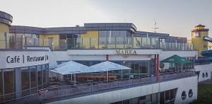 Entrance and outdoor seating at Marea in Borkum