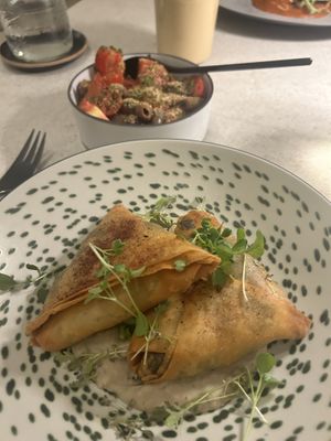 Samosas w/ side dish tomato salad  at One80  in Valletta