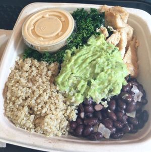 protein bowl with marinated kale, lemon un-chicken, black beans, quinoa, guacamole and tahini dressing  at Blossom Du Jour - Midtown in New York City