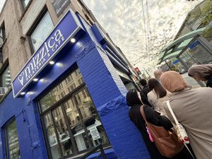 Line out the door & around the corner!  at Mizzica Gelateria & Cafe in Toronto