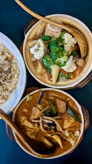 Vegan ME Bestseller Assam Fish Claypot Curry, Vegan Claypot Tofu in Teochew Style, Veganised Wok-Fried Rice with Diced Taro at Mother Earth Classic - 大地之素 in Central Singapore