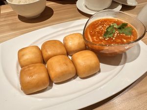 Golden bun with Chilli Crab Sauce (vegan)  at Mother Earth Classic - 大地之素 in Central Singapore