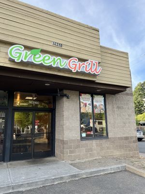 Exterior sign / entrance in the mini mall  at Green Grill in Guerneville