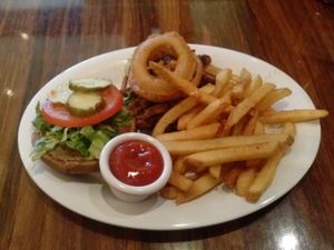 All American Stack sandwich with Yukon fries at Veggie Grill by Next Level - Santana Row in San Jose