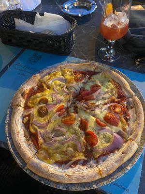 Margherita with plant cheese,cherry tomatoes and onions. at Archontiko in Skiathos
