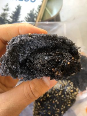 Heavenly, thick almond-buttery paste with pieces of almond and sesame, within fluffy and light, steaming hot bread at Pun-Pao Steamed Buns in Chiang Mai