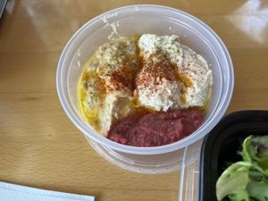 Hummus with beet purée  at Sprig Contemporary Greek Kitchen in Vancouver