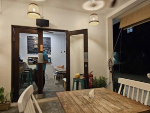 Indoor and outdoor seating. at Hermit's Restaurant in Dhigurah