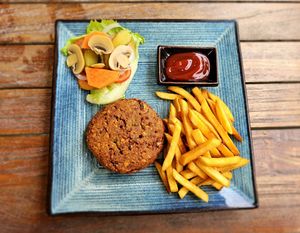 Falafel burger (no bun on my request). at Hermit's Restaurant in Dhigurah