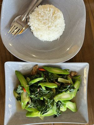 Stir-fried kale with shiitake mushroom (50 THB)  at Kinphak Cafe  in Chiang Mai