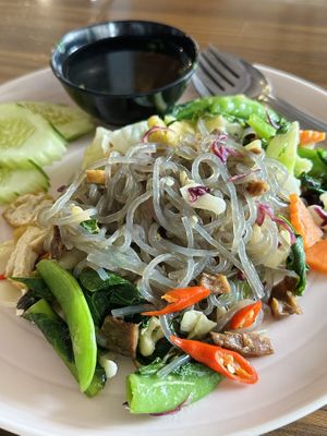 Stir-fried black konjac noodles with Thai herbs (60 THB) at Kinphak Cafe  in Chiang Mai
