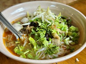 Nam ngiaow (50 THB). You can add any toppings you like! at Kinphak Cafe  in Chiang Mai