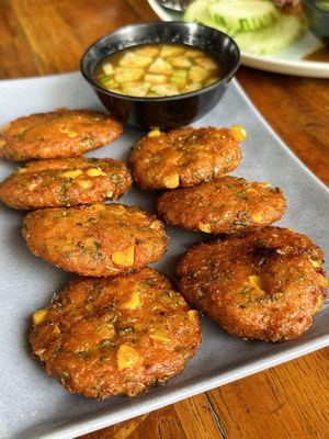 Fried carrot and corn with Thai curry cakes (60 THB)  at Kinphak Cafe  in Chiang Mai
