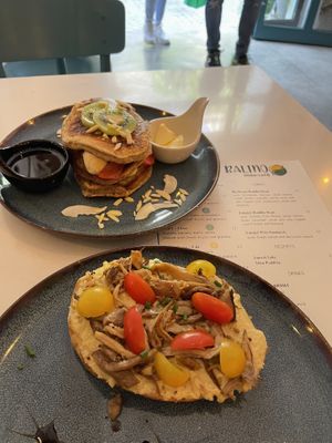 Pancakes and tostada with hummus and mushrooms   at Balino Yoga Café  in Sevilla