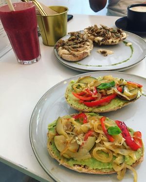 Toast with mushrooms + hummus and guac + bell pepper  at Balino Yoga Café  in Sevilla