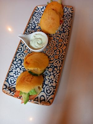 Sandwich-like bites ... Arepas at Balino Yoga Café  in Sevilla