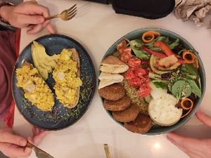 Tofu toasts and falafel salad at Balino Yoga Café  in Sevilla