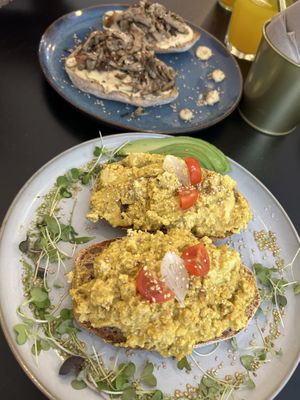 Tofu scramble toast + hummus and mushroom toastt   at Balino Yoga Café  in Sevilla