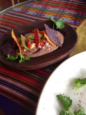 Nachos with avocado, bean dip and vegan cheese at PSI in Lisbon