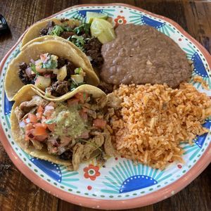 top->bottom: carne asada, al pastor, and pollo with beans and rice😍  at Sugar Taco in Long Beach