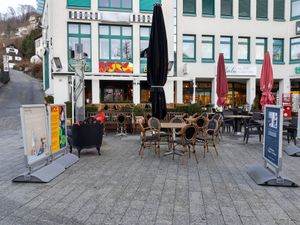 Exterior with weird logo... at Burg Brasserie in Vaduz