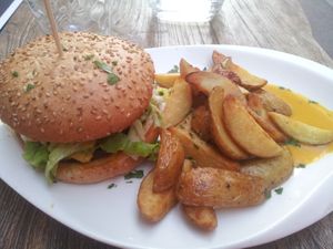 Burger vegan, steak de lentilles, cheddar vegan, pommes de terre sautées at Le Grenier de Notre Dame in Paris