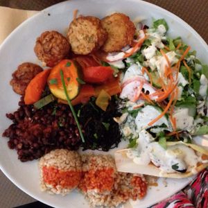 I ordered the first vegan plat on the menu and it was fantastic! It was brown rice and adzuki beans with tomato sauce, ratatouille vegetables, seitan, fresh crisp salad with creamy vegan dressing, endive with a pumpkin purée, and wakame seaweed.  at Le Grenier de Notre Dame in Paris