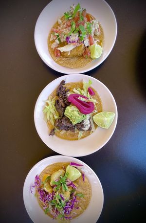 Three fantastic tacos, 🌮 fIsH , cauliflower, smoked mushroom. 🍄 All very good  at Veggie Grill by Next Level - The Dome in Hollywood