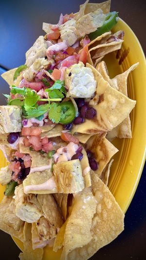 Nachos with tempe 🥳instead of beyond 🤨  at Veggie Grill by Next Level - The Dome in Hollywood
