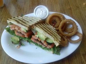 BLTA with onion rings at Veggie Grill by Next Level - The Dome in Hollywood