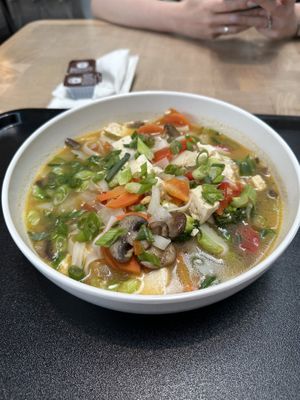 Hot rice noodles with vegetables with a veggie broth. Add the garlic as it was quite flavourless without it.   at Urban Pantry in Orlando