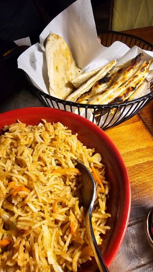 Garlic rice, naan at Spice Cafe & Restaurant in Belgrade