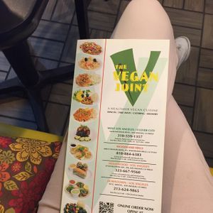 menu with locations and numbers at The Vegan Joint - Hollywood in Los Angeles