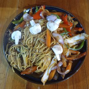 Full plate of chop suey ! at Fer's Grill House in Puerto Baquerizo Moreno